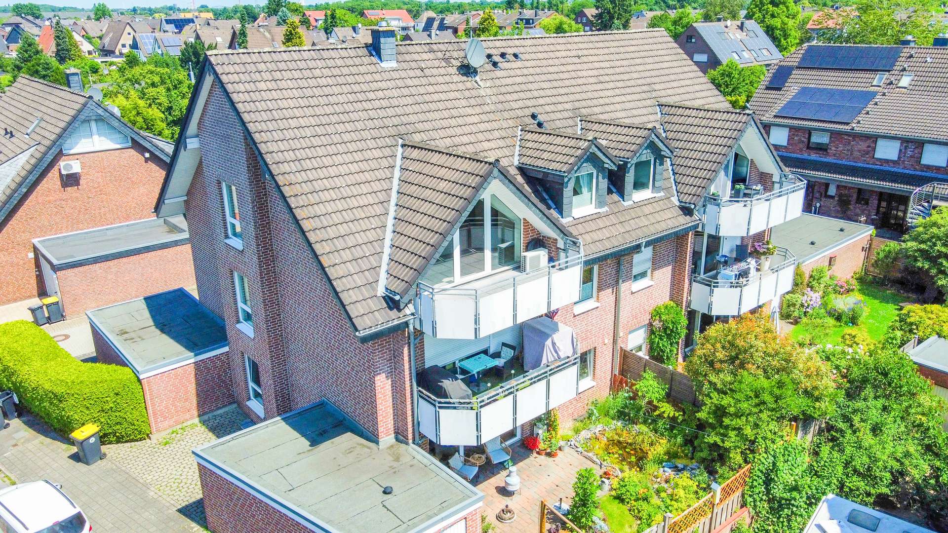 Hausansicht - Moderne Eigentumswohnung in gepflegtem Gebäude und in attraktiver Lage am Erholungsgebiet Schwafheim