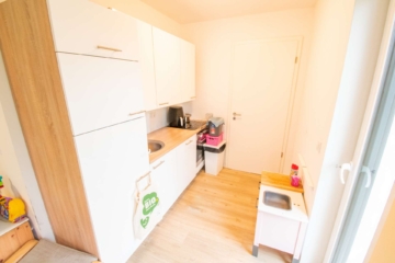 Küche - Seltene Gelegenheit: Neuwertige und energieeffiziente 2-Zimmer-Erdgeschosswohnung mit Garten
