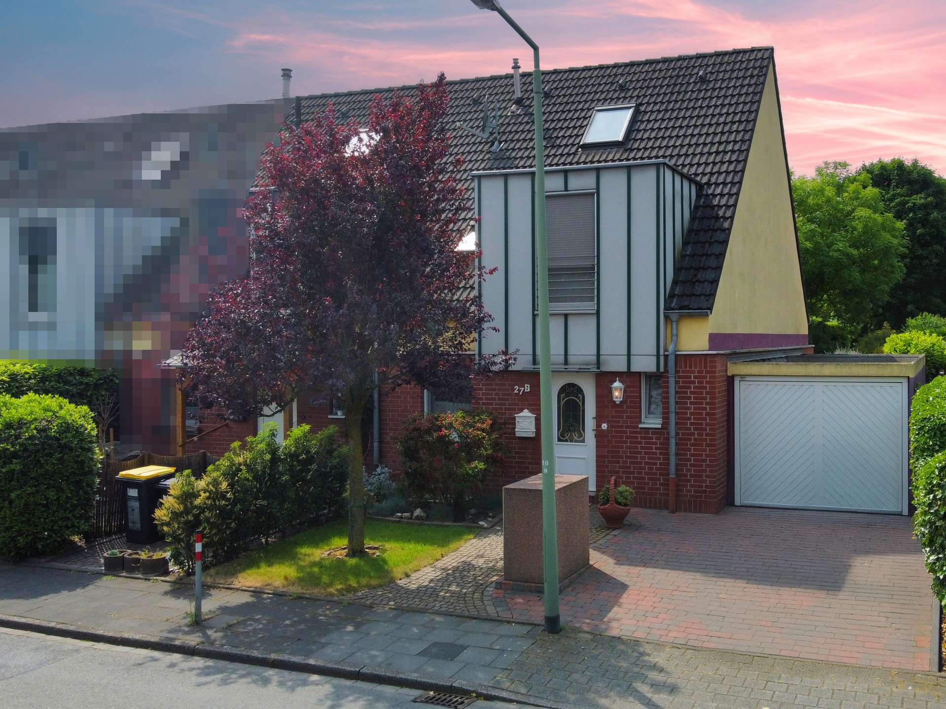 Frontansicht - Gepflegte Doppelhaushälfte in unmittelbarer Nähe zum Rhein im beliebten Duisburg-Mündelheim