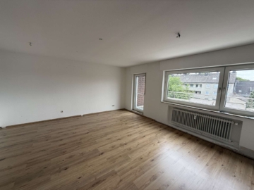 Wohnzimmer - Moderne 3-Zimmer Wohnung mit zwei Terrassen