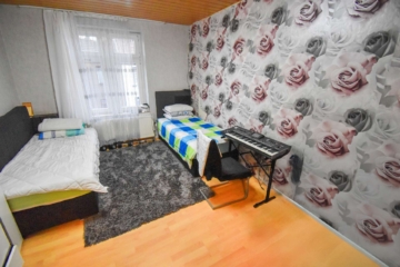 7 - Top-Rendite: Attraktives Wohnhaus mit Ausbaureserve im Dachgeschoss