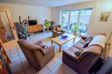 Wohnzimmer EG rechts - Hochwertig errichtetes Mehrfamilienhaus mit 7 Wohneinheiten in absoluter 1A-Lage von Holderberg